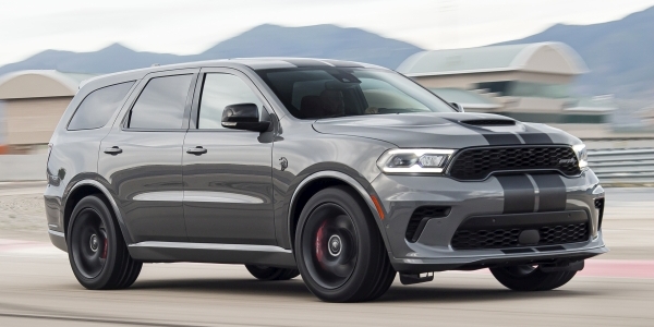 Grey 2021 Dodge Durango driving on a racetrack.