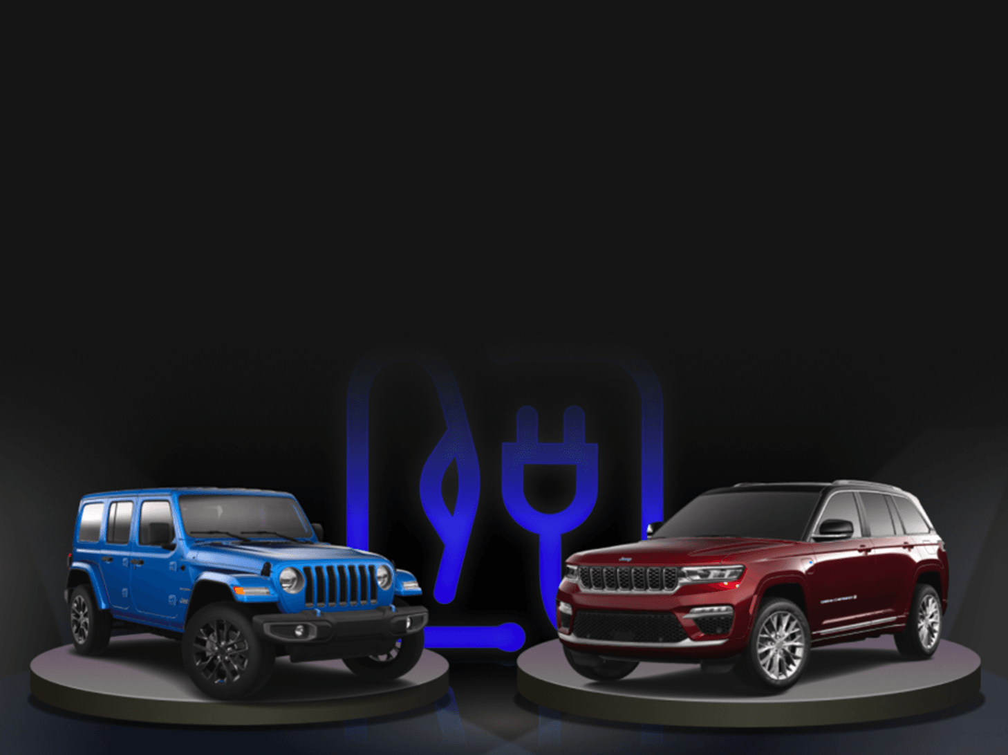 View of a bleu 2023 Jeep Wrangler and a red 2023 Jeep Grand Cherokee against a black background.