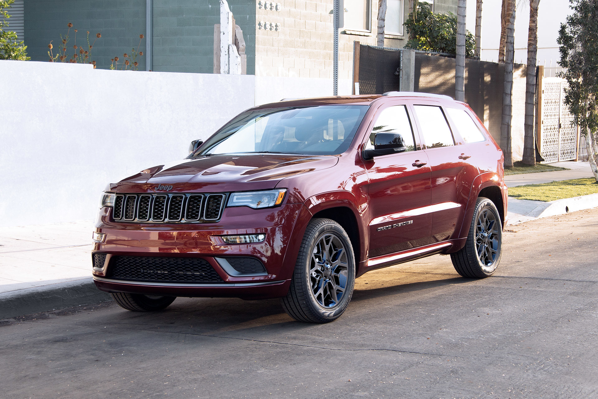 2022 Grand Cherokee Limited X in Velvet Red parked on the side of a urban road