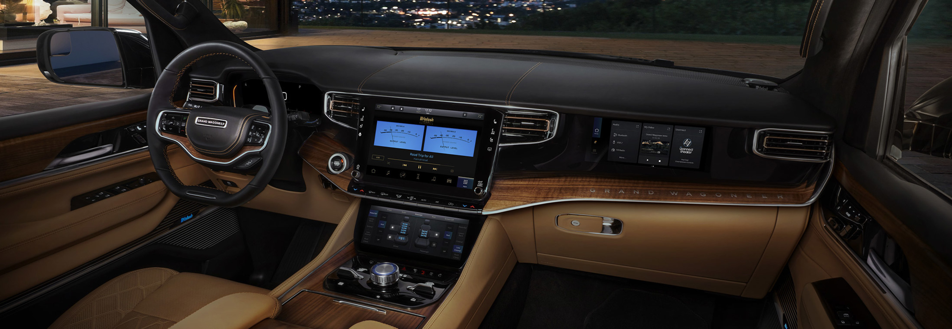 Close up view of the available UConnect and interactive centre console in the 2022 Jeep Grand Wagoneer