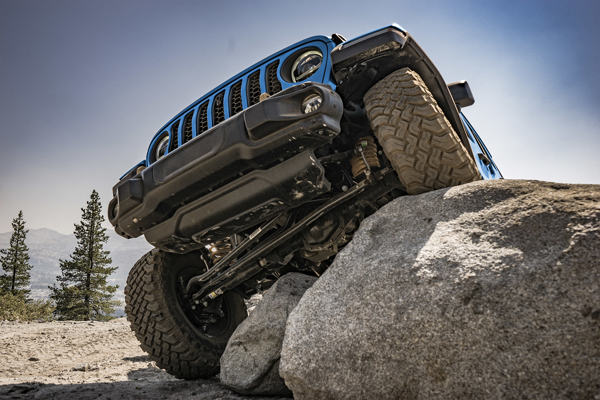 Jeep Wrangler Rubicon 392 with 4x4 capabilities driving over rocks