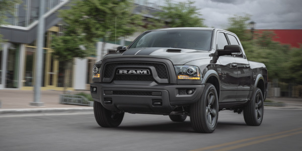 Grey 2021 Ram 1500 DS being driven fast on the road