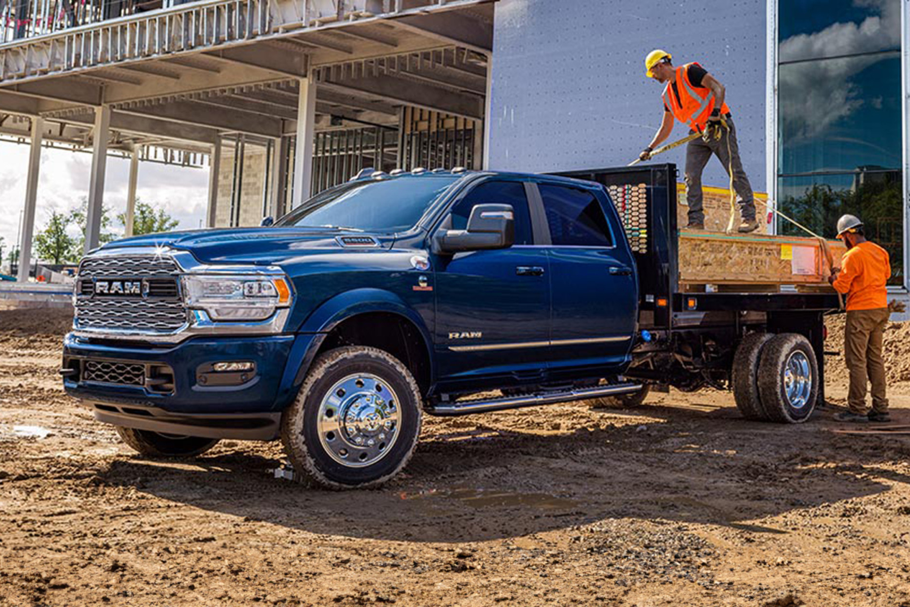 View of a blue 2024 Ram truck shown outside of a construction zone.