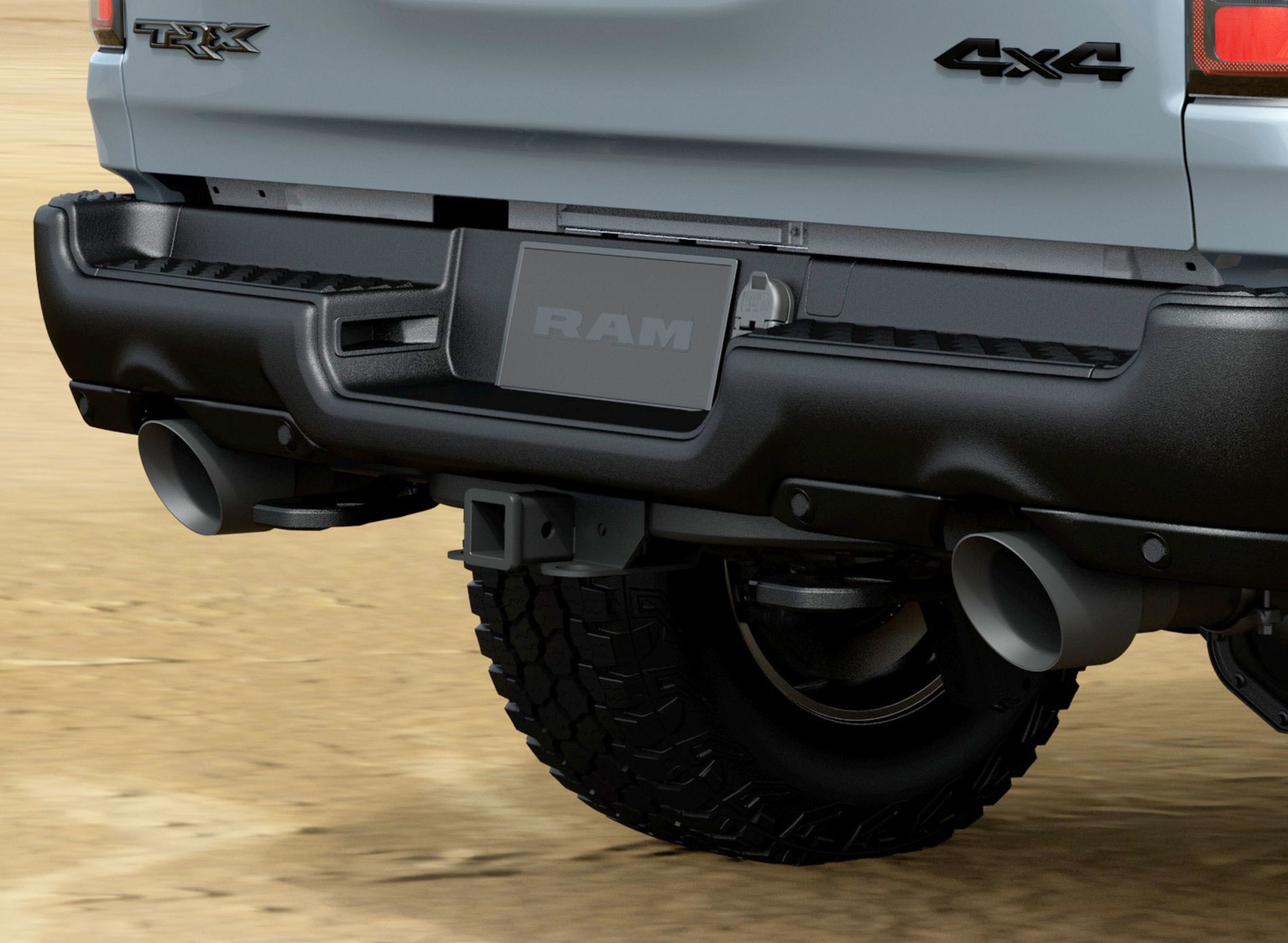 Close-up view of the dual-exhaust pipes on the Ram 1500 TRX.