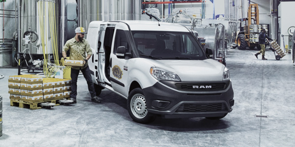 2020 Ram ProMaster City being loaded with boxes in a warehouse